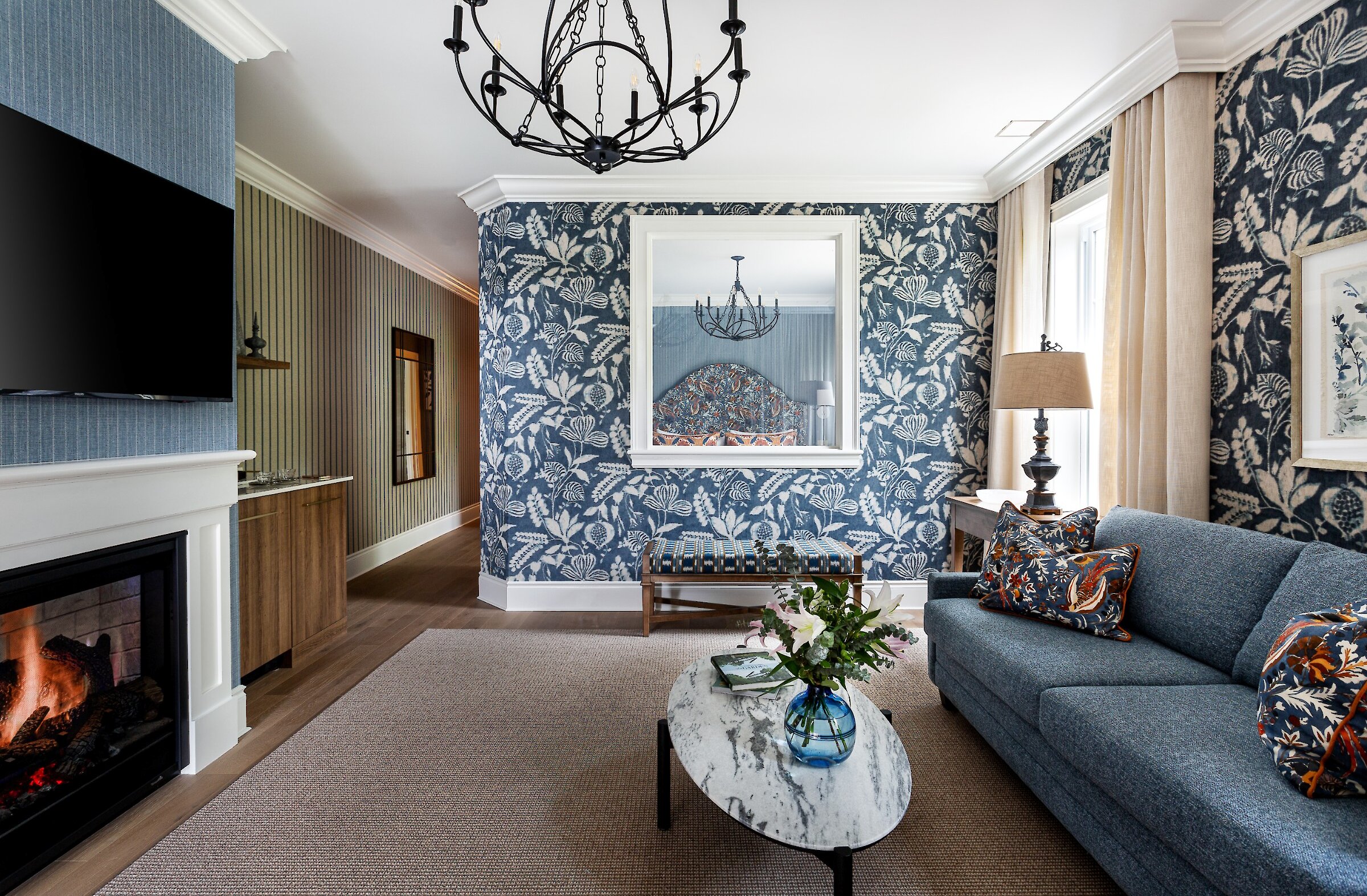 Traditional-style living room with sofa, coffee table and fireplace